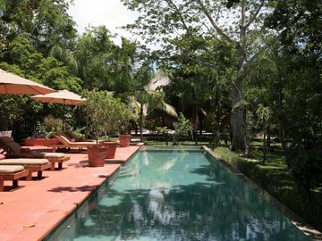 Propiedad estilo hacienda con 6 cabañas en venta en Tulum