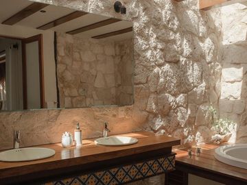 Propiedad estilo hacienda con 6 cabañas en venta en Tulum