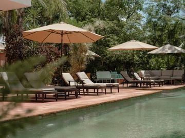 Propiedad estilo hacienda con 6 cabañas en venta en Tulum