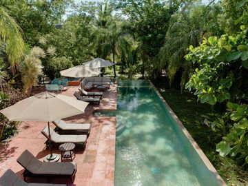 Propiedad estilo hacienda con 6 cabañas en venta en Tulum