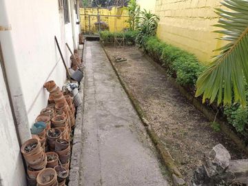 FOR SALE PRIME RESIDENTIAL LOT WITH OLD BUNGALOW IN A HIGHLY SECURED VILLAGE