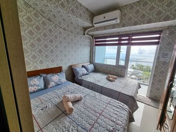 1-BEDROOM FURNISHED CONDOMINIUM UNIT with VIEW OF TALL