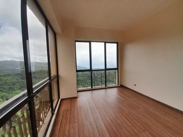 Condo Unit (Studio type) with Balcony and over looking of Taal here at Splendido