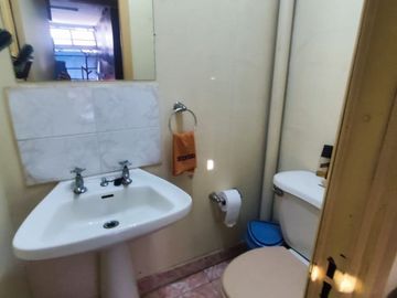 DETRÁS DEL COLEGIO LIAHONA