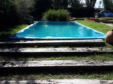 FUNES TOWN- LOTE  CON MEJORAS  Y PISCINA