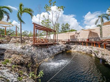 Apartment for sale in development with two natural cenotes TU-086