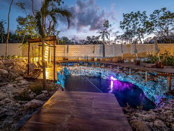 Apartment for sale in development with two natural cenotes TU-086