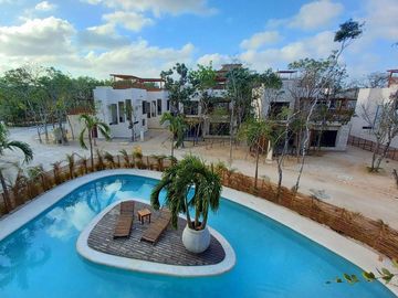 Apartment for sale in development with two natural cenotes TU-086