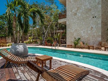 Apartment for sale in development with two natural cenotes TU-086