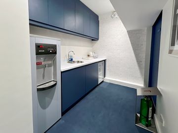 Find office space in HQ Triumph Building for 5 employees with everything taken care of