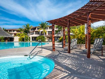 Departamento en Venta en Isla Palmares con vista Alberca en El Tigre Club de Golf Nuevo Vallarta
