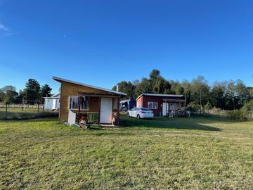 VENDO PARCELA CON CASA, 2 CABAÑAS Y BODEGA EN RÍO BUENO