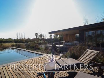 Amplia parcela en exclusivo condominio de Santa Rita