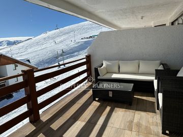 Ski in ski out gran terraza vista a Santiago