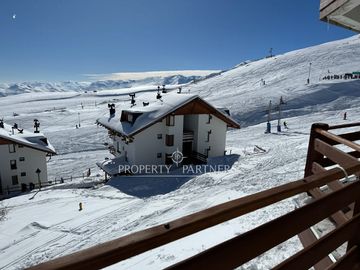 Ski in ski out gran terraza vista a Santiago