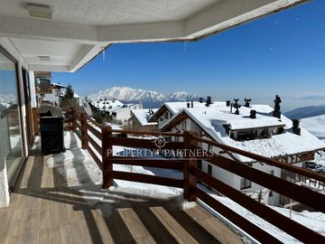 Ski in ski out gran terraza vista a Santiago