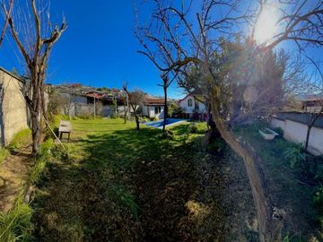 QUILPUÉ CENTRO. VENDE TERRENO CON DOS CASAS Y PISCINA 10X5