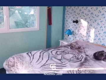 VENTA Casa 3 ambientes, 61 m2, lote de 336 m2, Calle 27 s/n, Altos de Cumelen, Villa la Angostura