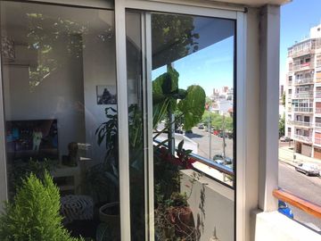 2 amb al frente con terraza propia , 110 m2 totales, dos cocheras , Sum , Piscina .