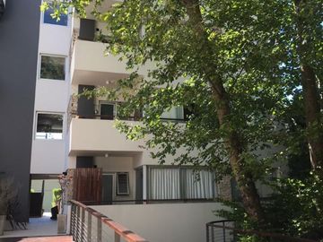 2 amb al frente con terraza propia , 110 m2 totales, dos cocheras , Sum , Piscina .