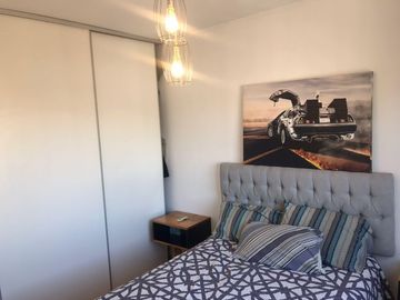 2 amb al frente con terraza propia , 110 m2 totales, dos cocheras , Sum , Piscina .