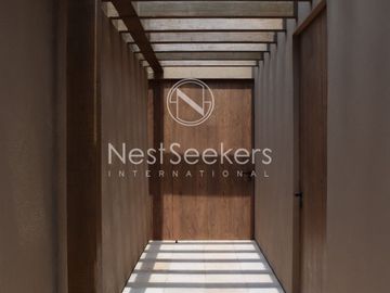 Casa en venta en condominio en entorno de montañas y bosque.