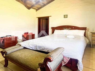 En venta terreno con casa en Sangolqui