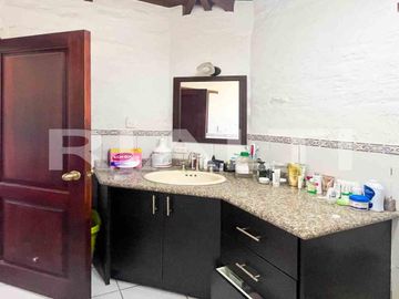 En venta terreno con casa en Sangolqui