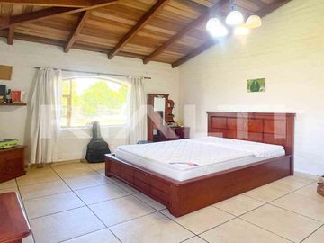 En venta terreno con casa en Sangolqui