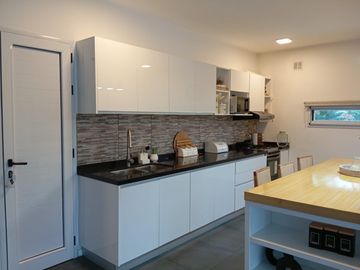 Casa de cinco ambientes con jardin y piscina en Greenville Barrio Cerrado Hudson