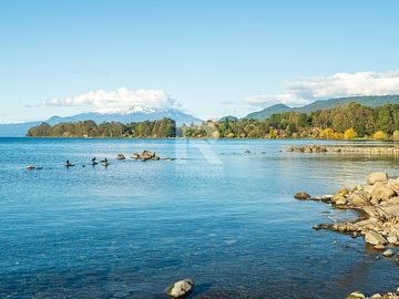 PARCELA EN CONDOMINIO CON VISTA VOLCANES Y ACCESO AL LAGO.