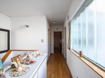 Casa en venta de 2 dormitorios mas comodín con cochera en Fisherton, Rosario. Permuta por Depto