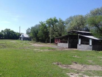Increíble Terreno con 2 Casas, Nave y Bodega en Pesqueria