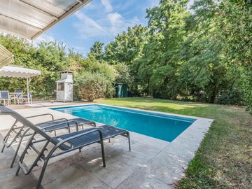 Casa en  venta en Boat Center , 3 dormitorios, piscina, quincho, cochera y amplio parque con amarra