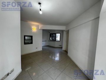 Departamento tres ambientes con cochera cubierta