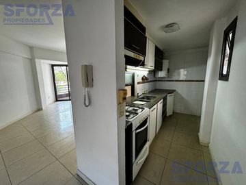 Departamento tres ambientes con cochera cubierta