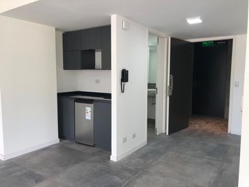 Loft remodelado y equipado. Cochera y  amenities en Quartier Puerto Retiro.
