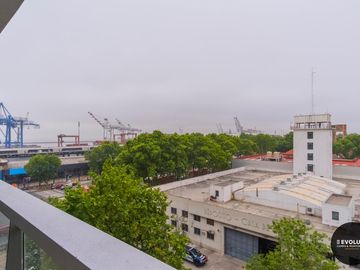 Loft remodelado y equipado. Cochera y  amenities en Quartier Puerto Retiro.