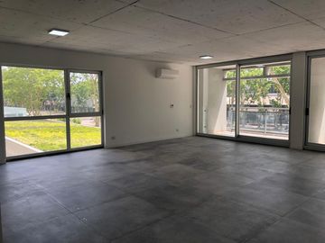 Loft remodelado y equipado. Cochera y  amenities en Quartier Puerto Retiro.