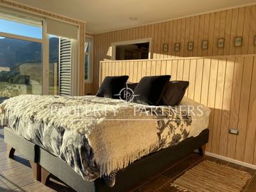 Patagonia, encantadora casa Carretera Austral, orilla rio El Lobo