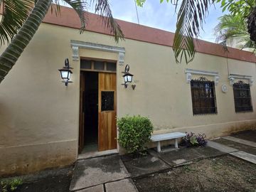 Casa con terreno amplio cerca de la plancha