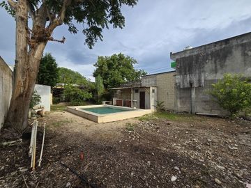 Casa con terreno amplio cerca de la plancha