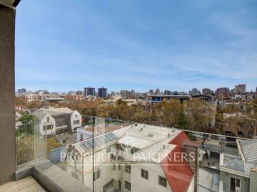 Departamento estilo mariposa en venta cercano a Metro Salvador, Providencia.