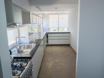 Venta Departamento dos dormitorios cochera y baulera Centro Rosario