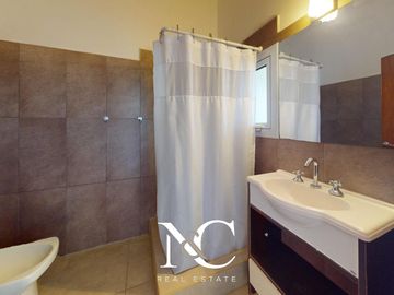Casa en venta en Costa Esmeralda con fondo libre arbolado