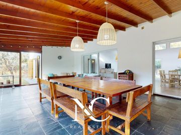 Casa en venta en Costa Esmeralda con fondo libre arbolado