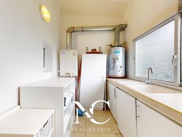 Casa en venta en Costa Esmeralda con fondo libre arbolado