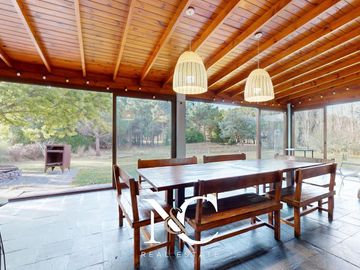 Casa en venta en Costa Esmeralda con fondo libre arbolado