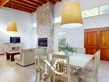 Casa en venta en Costa Esmeralda con fondo libre arbolado