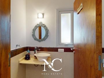 Casa en venta en Costa Esmeralda con fondo libre arbolado